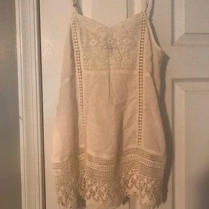 Embroidered flowy tank/camisole.